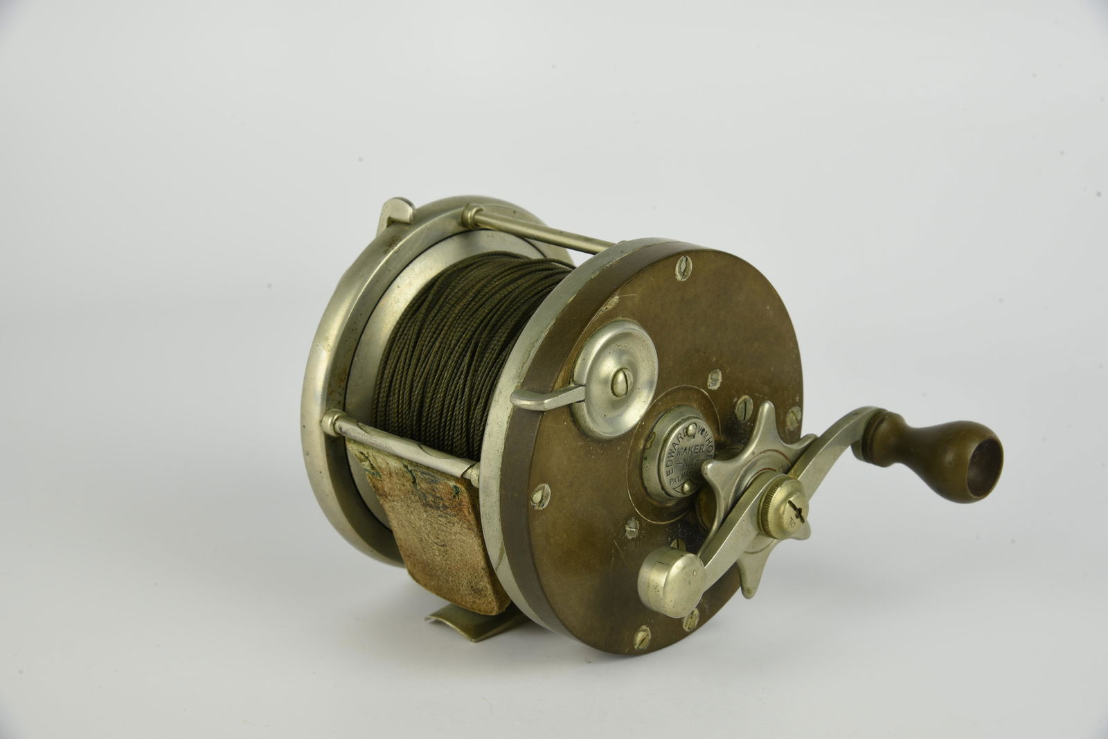 Edward Vom Hoffe Model 621 Reel: Salt water reel 3 7/8" diameter. Stamped 4 -0. In good used working condition.