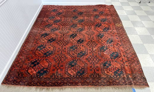 Ersari Carpet, Southeast Turkmenistan Ca. 1900: 9' 3" x 7' 11". From a home in Saratoga, NY. Worn and in fair condition. There is a 7" square sewn in repair along one edge.