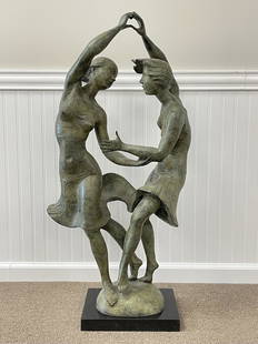 Milton Hebald Bronze Sculpture Pas de Deux: Two women dancing. Green patinated bronze signed and dated 1988 on base with foundry mark, 40 1/2' tall on a black marble base 9 1/2" x 12 1/2". Provenance: Gifted in support of museum operations to T