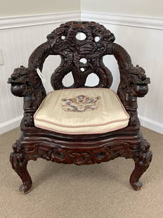 Heavily Carved Asian Arm Chair with Dragons: 34" tall. In good condition. From a Doctor's home in Watertown, NY.