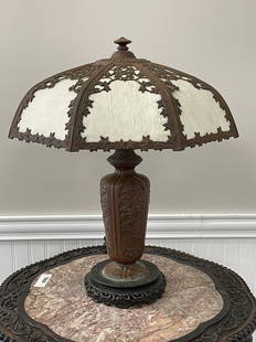 Slag Glass Overlay Table Lamp: early 20th century, 18" diameter shade, glass is in good condition. Double socket base made of white metal, some paint flaking, Asian motif. Socket marked Beardsley Studios. Some small leaf foliage