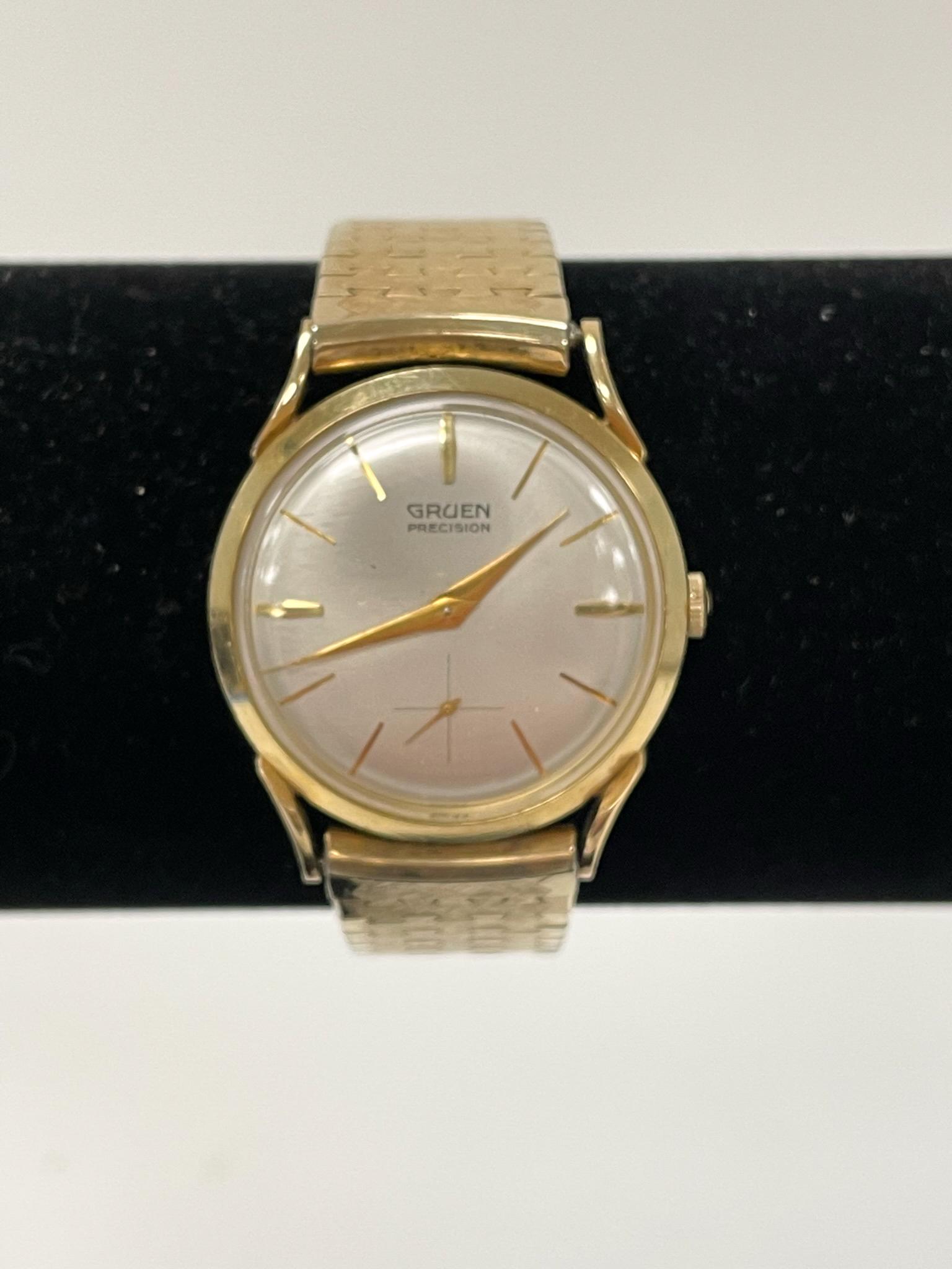 Gruen Precision 14kt Gold Men's Wrist Watch: comes with box. All watches and clocks are sold as is.