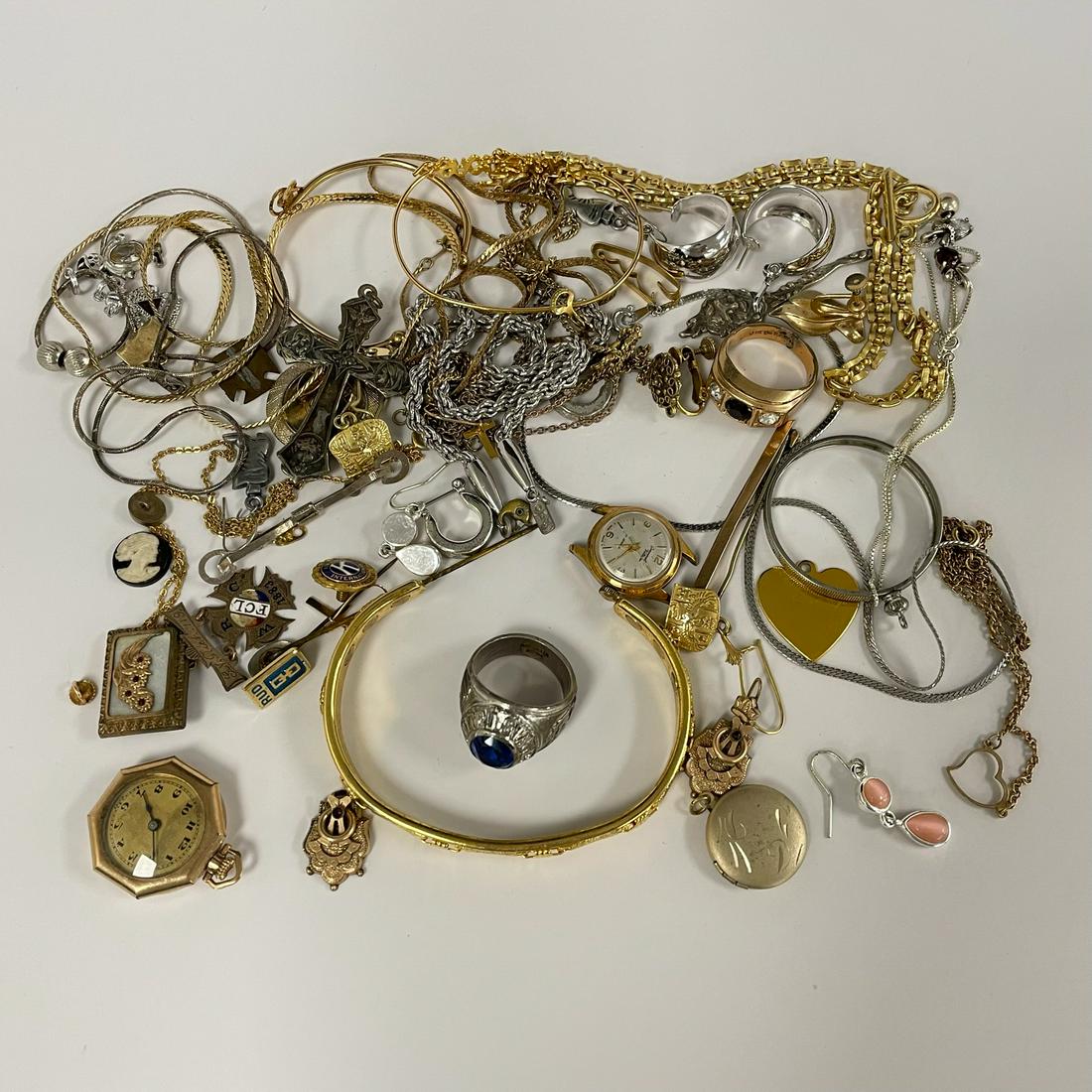 Assortment of Estate Jewelry: includes: watches, pins, chains, bracelets and more.