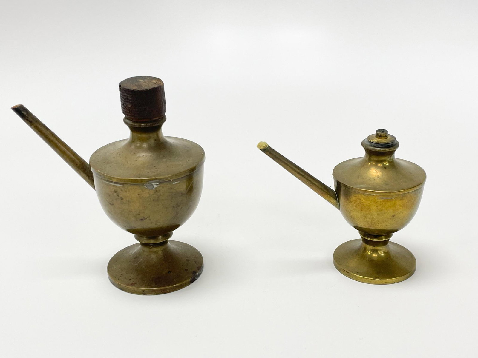 2 Brass Whale Oil Lamps: circa 1820-1840. One is 5" tall and one is 3 1/2" tall. From the Estate of Carlton Stickney, County & Town Historian and Lifetime Collector.