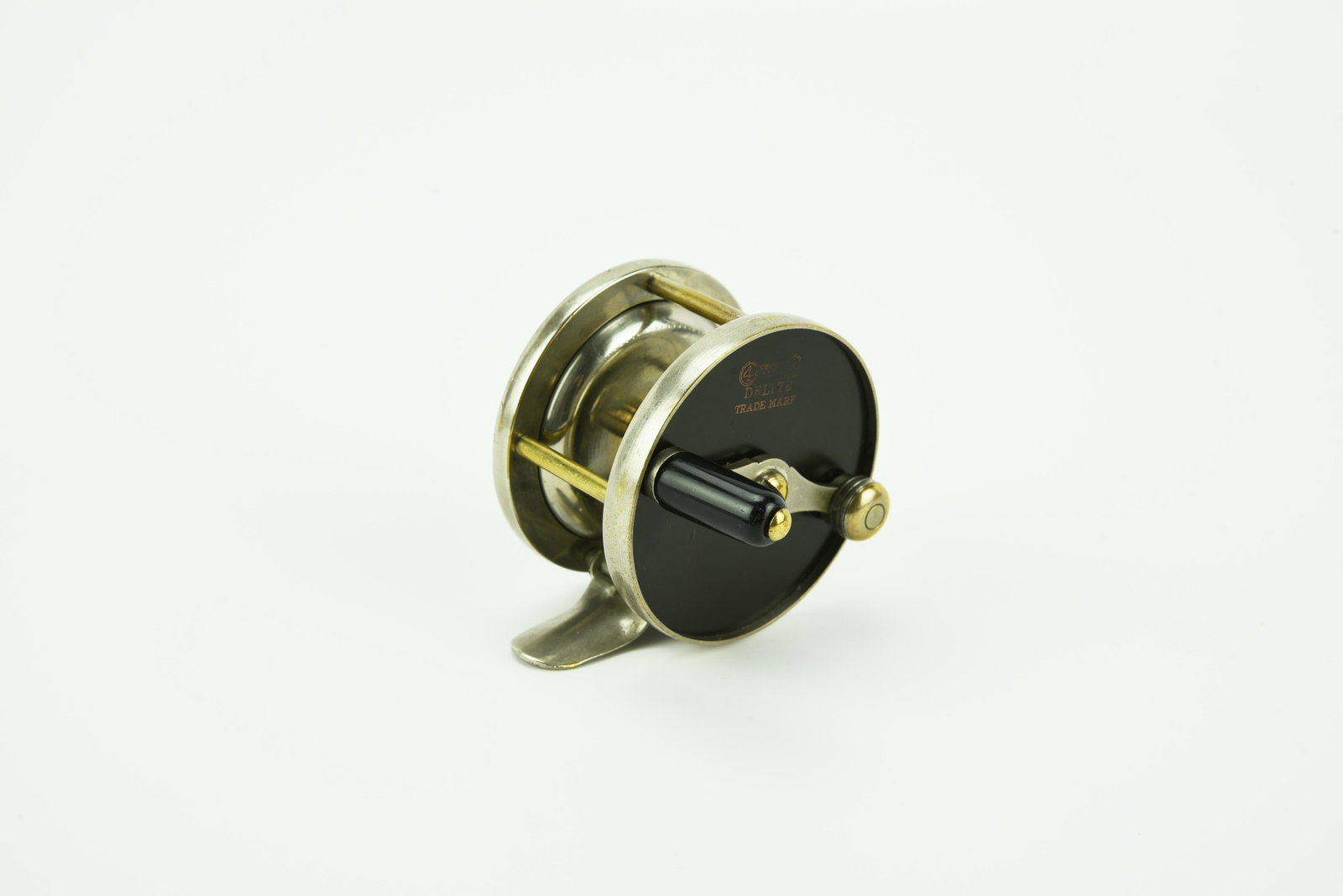 4 Brothers Delite Trout Reel: 60yd, working click switch and screw-off end cap, Ex- condition.