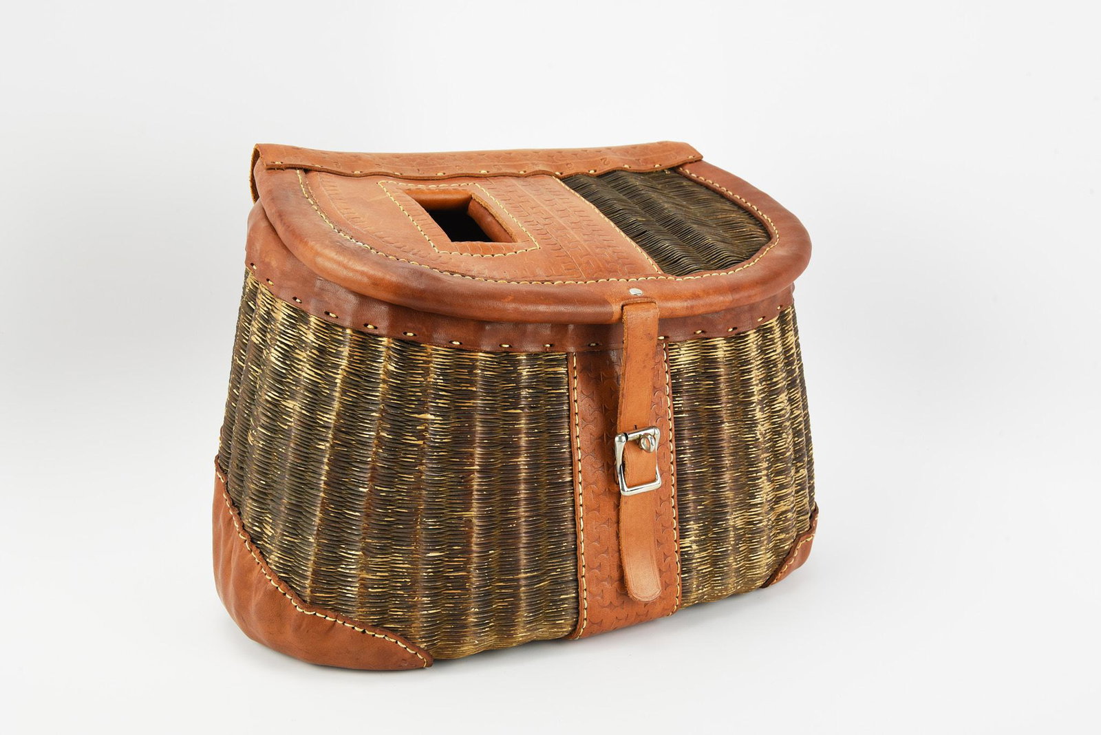 Leathered Geiger Creel: 15" wide x 10 1/4" tall, french weave basket, professionally leathered by the late Robert E. Geiger, stamped with a number 4 under â€œGeiger Maker Tacoma-Seattle" and serial 029 on the carry handl