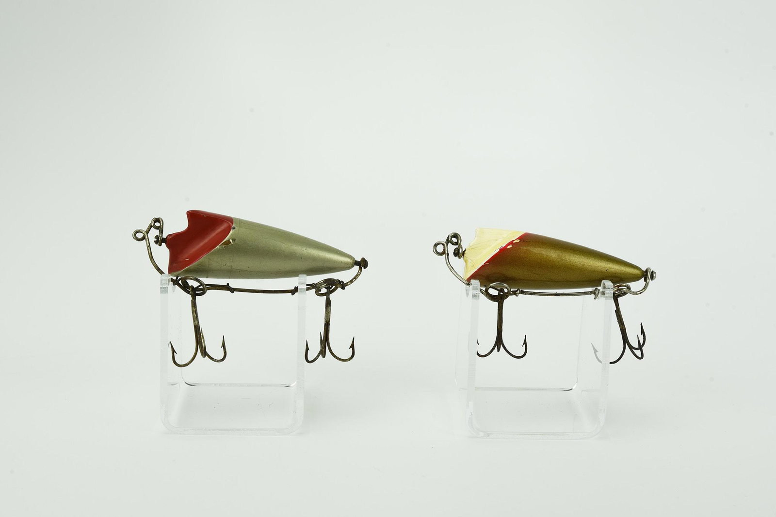 2 Bite-Em-Bates: Each complete with its heavy wire harness, silver/aluminum body with red face (VG+), and white/red/gold (VG+/Ex-). Both in better condition than most.