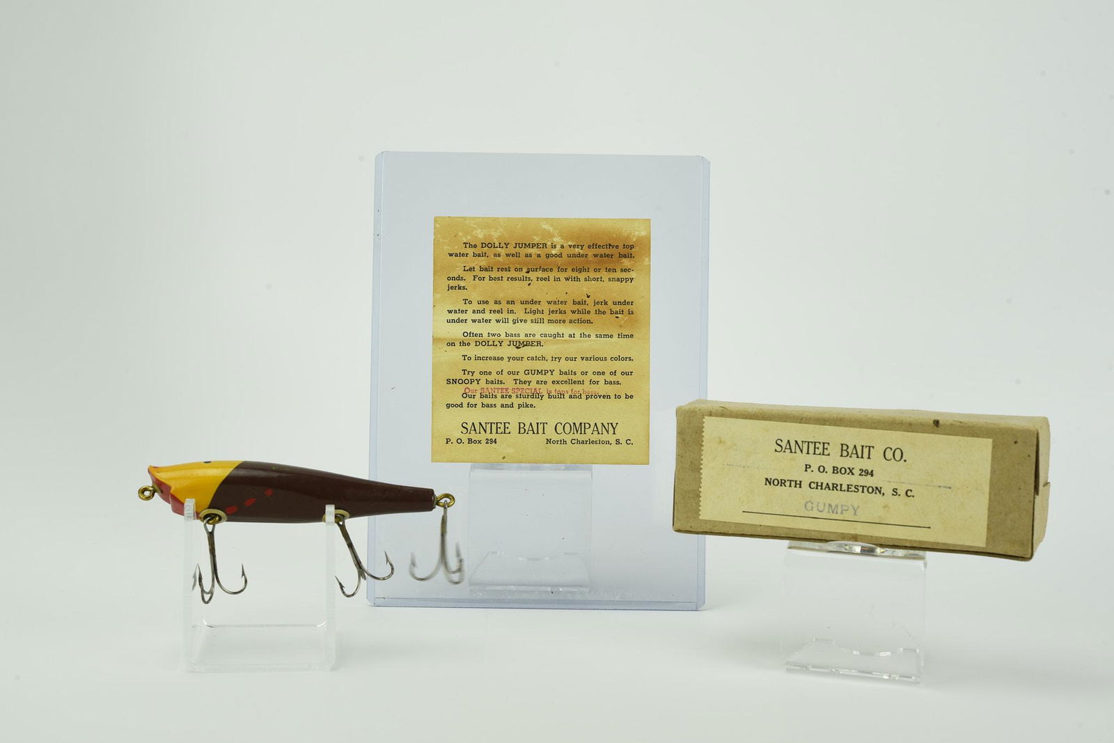 Santee Bait Co. Grumpy: Yellow head, brown body with spots, "pointed" belly model, most likely unfished, in a one-piece box stamped Grumpy on the top label, Santee Bait Co. on the side, and a partial end label with only YH l