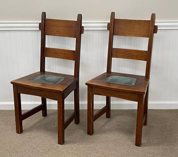 Pair Gustav Stickley Rabbit Ear Side Chairs #1291: Signed with red decal, original green leather seats, medium brown finish with light wear. Seat height is 18 inches.