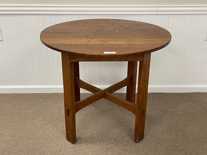 Stickley Brothers Mission Oak Table: 36" diameter, quarter sawn oak, stacked trumpet stretchers, good condition with some stains and wear to be expected. 30" tall. With Quaint Furniture Label.