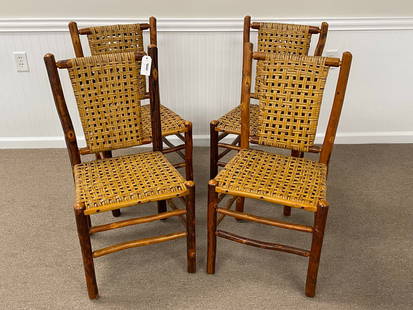 Set of 4 Signed Old Hickory Dining Chairs: in excellent condition with an amber shellac finish. 18" seat height.