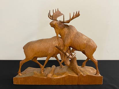 Fighting Bull Moose Wood Carving - C.Dube: in good condition, 17 1/2" long. Canadian carver.