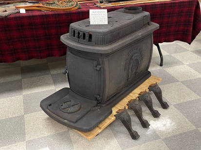 Horseshoe Forestry Company Wood Stove: circa 1900. St. Lawrence County. Complete and in good condition.