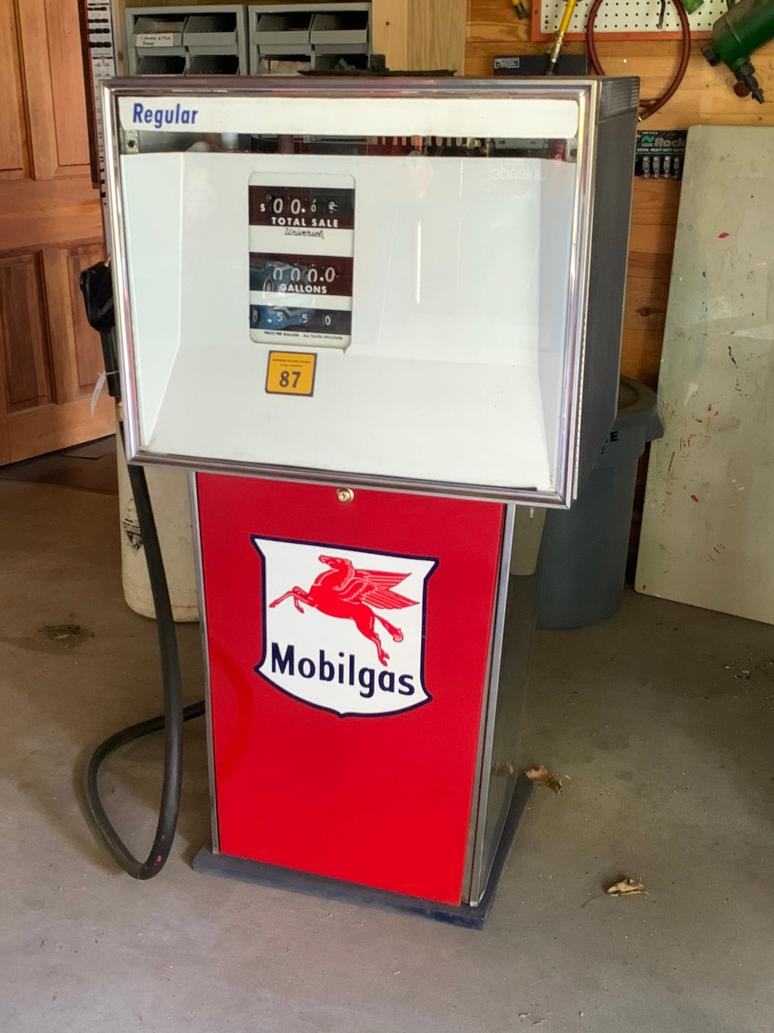 Mobil Gas Gas Pump: This pump was originally used at the boat marina in Ft. Covington, NY. The pump is in good condition. It was cleaned inside and outside and several coat of primer were applied as it was originally pai