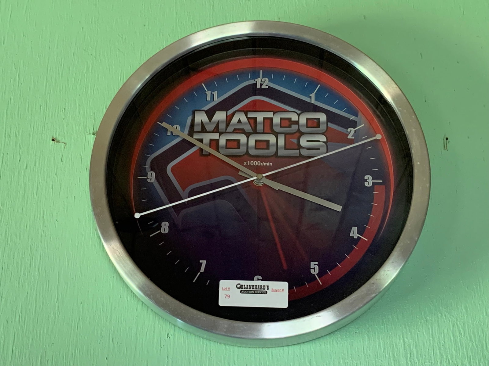 Matco Advertising Wall Clock: This is a 14" diameter clock with a brush metal case in good working condition.