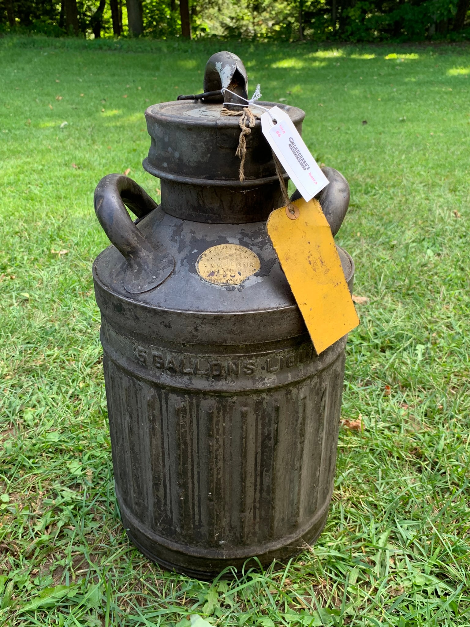 Ellisco 5 Gallon Oil Can with Lid: Made in Phil. PA of heavy gauge steel. It is in good condition with makers tags.