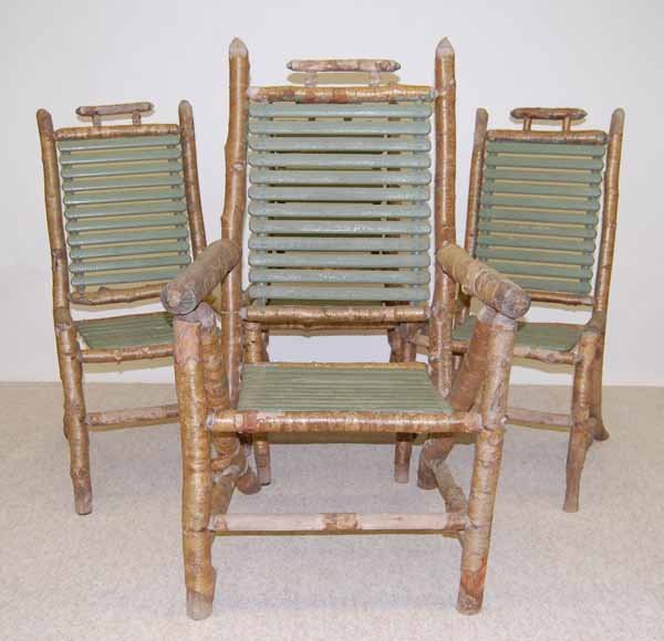 Set of 4 Yellow Birch Adirondack Chairs: From an early summer camp in the Warrensburg area. Back leg on arm chair has a repair.