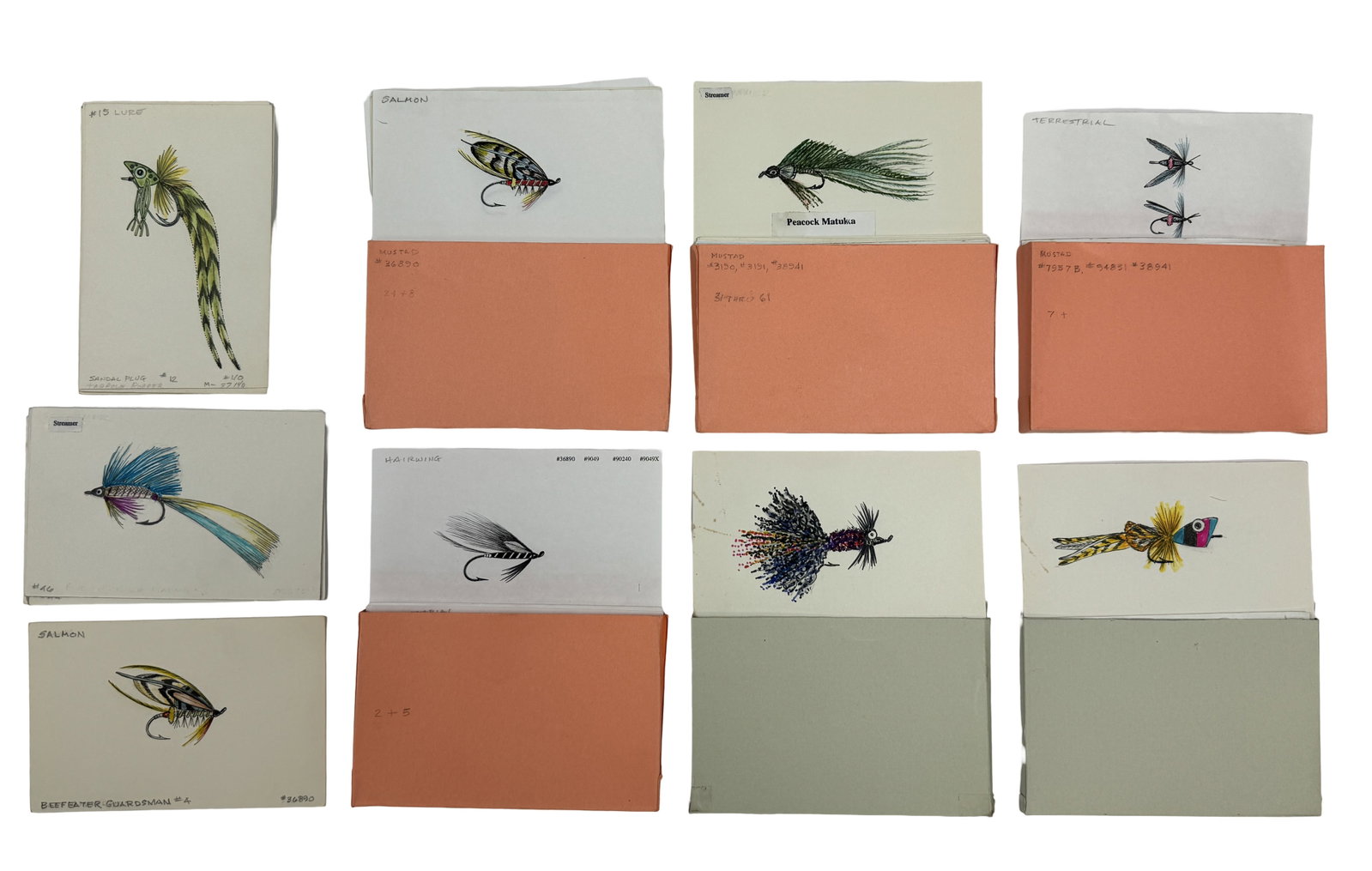 Fly Tier's Handbook Original Artwork: An illustrated reference on fly tying by Gene Kugach, the "Fly Tier's Handbook" was published in 2001. This lot includes 90+ fly drawings finished with watercolor and draft pencil sketches, on 6" x 3 