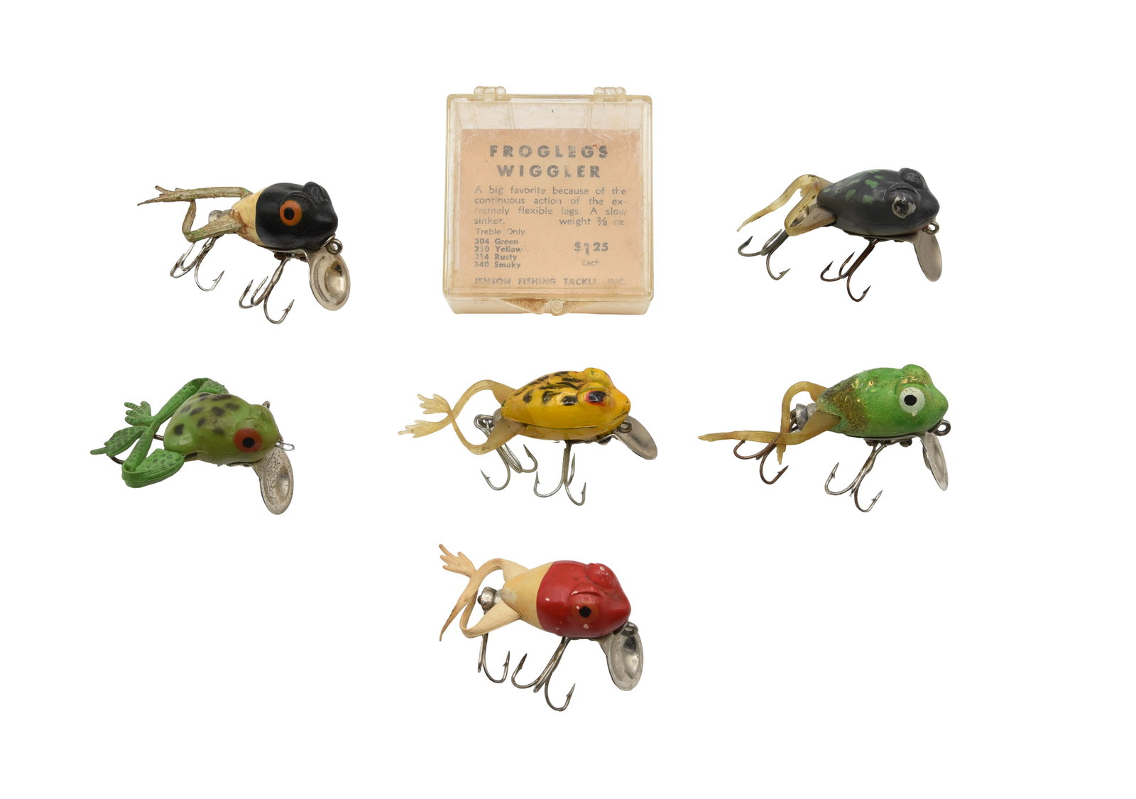 6 Johnson Froglegs: 5 Froglegs Midget Wigglers, one in a clear box with paper insert, and a Midget Kicker. All have some wear and/or soiling, colors as shown.