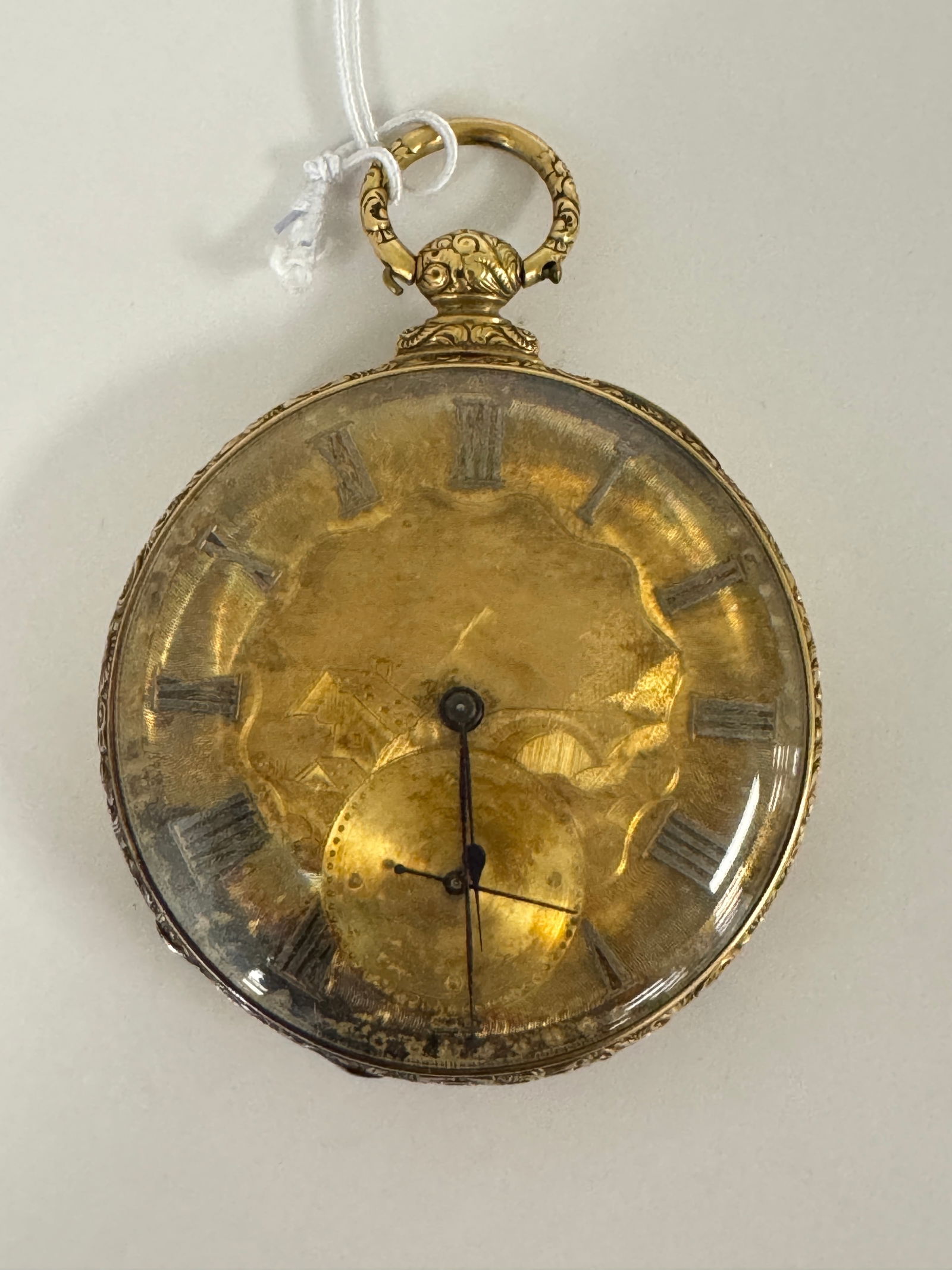 Gold Engraved Pocket Watch: engraved on back with reclining nude woman and panther. Face is engraved with a country scene. 13 jewels. Key wind, no key. Marked Bonnet, Geneva No. 1003. Gold content is not stamped, case is very so