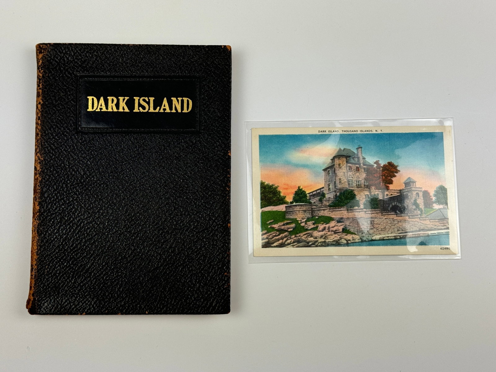 Dark Island,1000 Islands, Book and Postcard: leather bound book in very good condition. Circa 1920s. Singer Castle Keepsake.