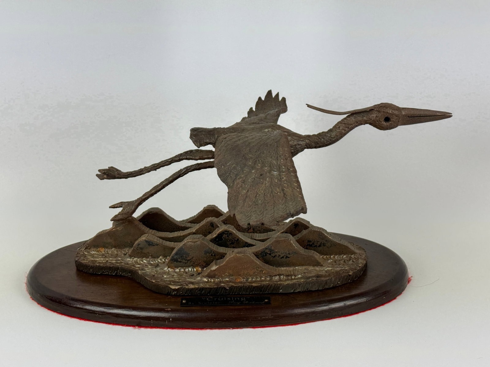 Gary Rubnick "Cruising" Blue Heron Steel Sculpture: circa 1980. 1000 Islands. 20" long x 18 1/2" wide x 9 1/2" tall.