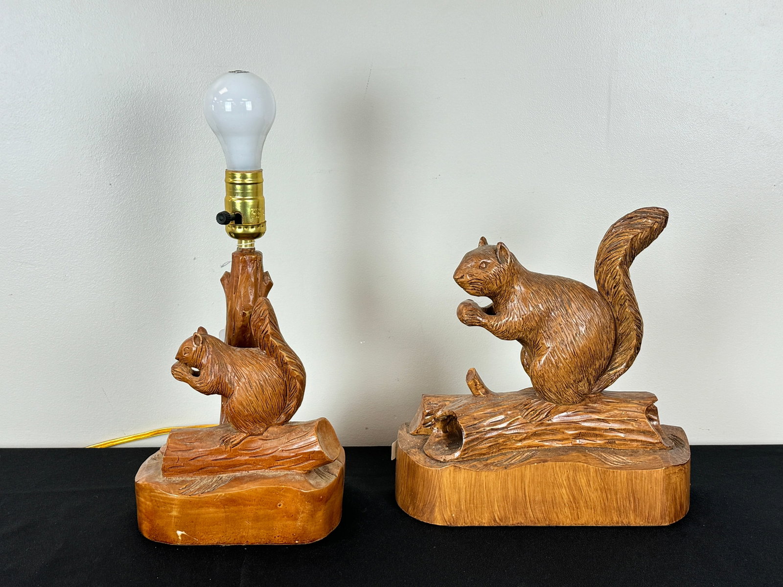 Dube Wooden Carved Squirrel and Lamp: Wood carving 10 1/2" tall. Faux wooden squirrel lamp is 15" tall