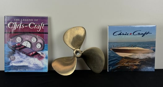 Brass Boat Prop and Two Chris Craft Books