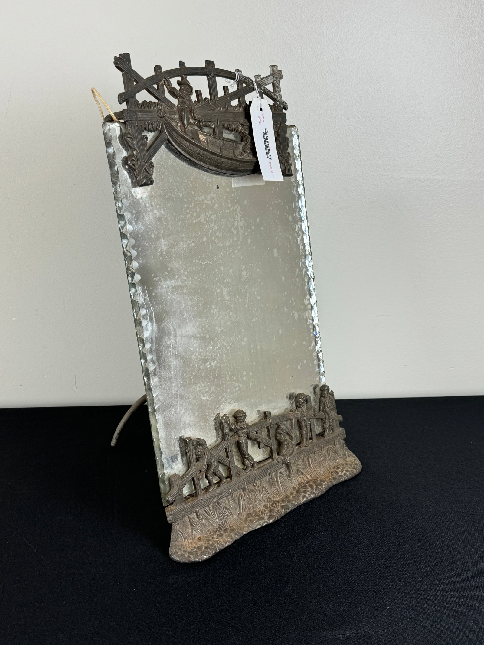 Standing Dresser Mirror with Boys in Boat: 17" tall x 10" wide. Metal all in good condition.