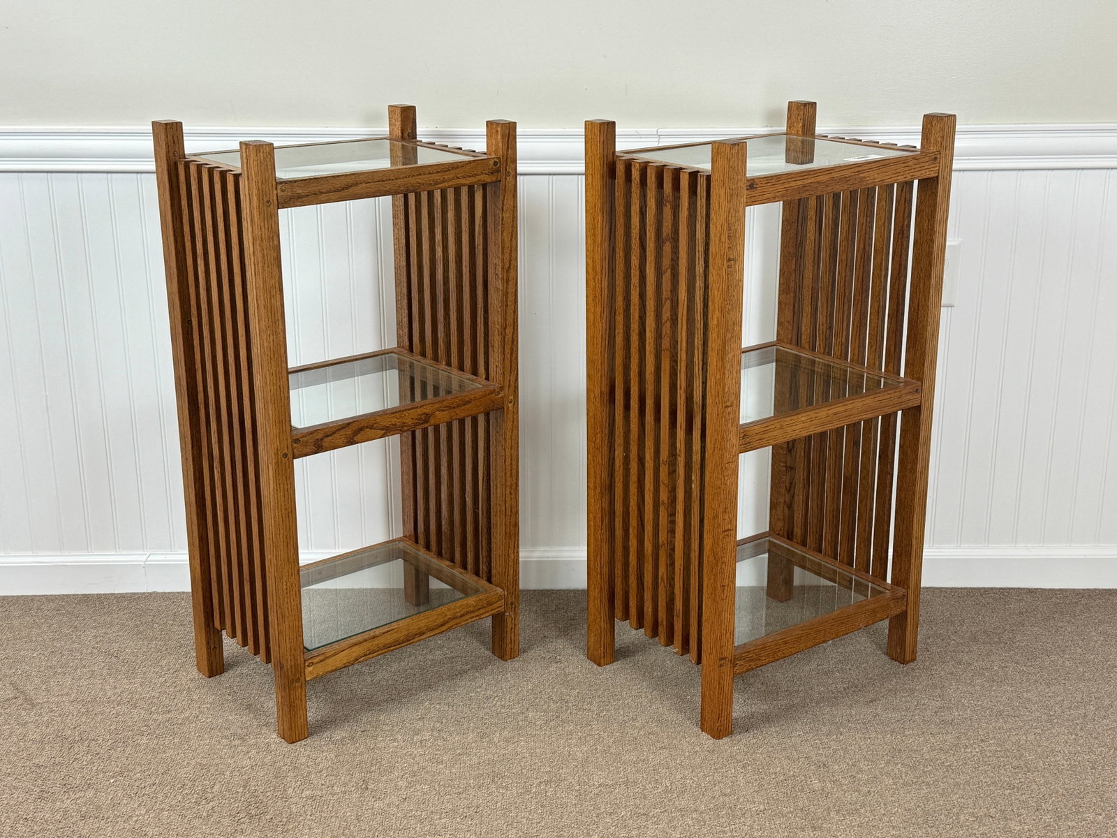 Pair of Oak Spindled Shelves: each with 3 glass shelves. 17 1/2" x 13" x 36" tall.