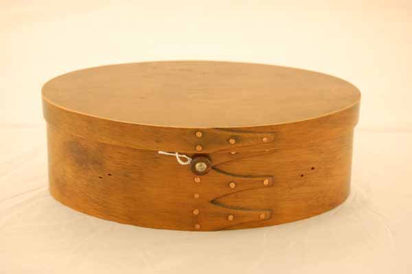 Shaker Oval Sewing Box: with 3 finger construction, copper tacks, blue silk fabric lining. Mid 1800's. Missing handle. 9 1/2" x 6 1/2" x 3"