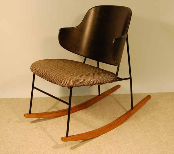 Mid Century Modern Molded Back Rocking Chair: w/ Black Leather Seat, Back & Arms. Chair has a molded plywood back and a fabric covered molded plywood seat. From the VanNess Estate in Potsdam. 22" wide x 30" tall x 33" deep.