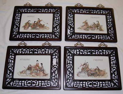 4 Chinese Hand Painted Porcelain Placques: of chinese figures with reticulated and wooden carved hanging frames. The porcelain placques are 10" x 15". Overall size 18 1/2" x 24"