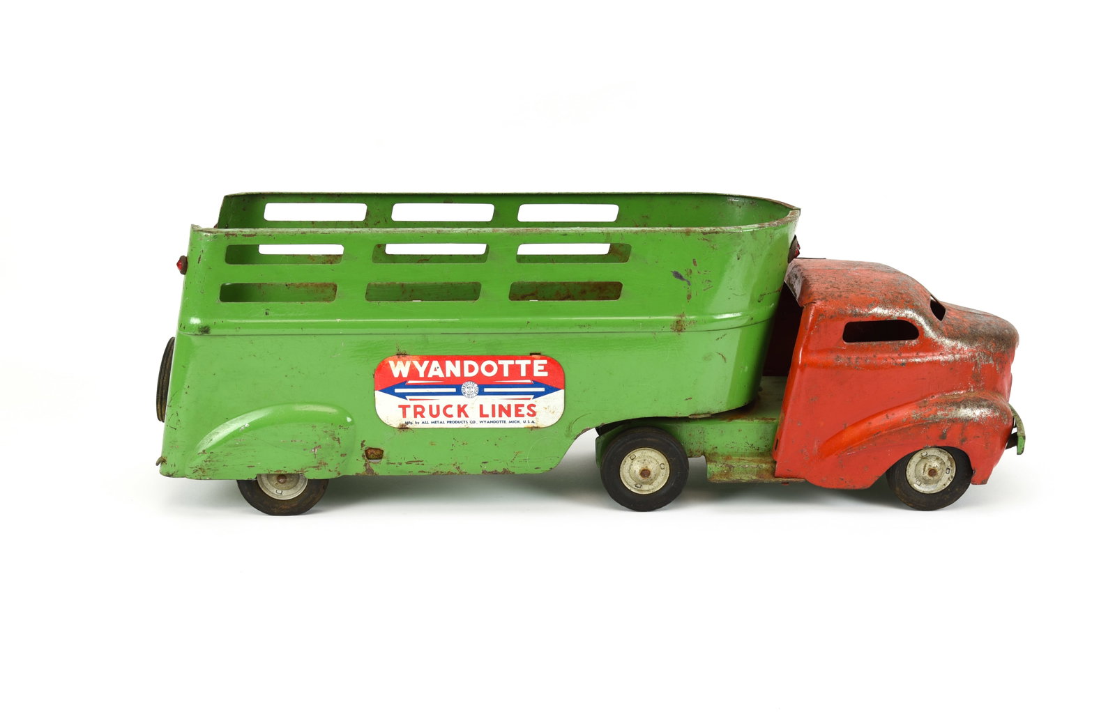 Wyandotte Truck Line Pressed Steel Toy Truck: surface wear, scratches and some rust. 24" L. Includes spare tire.