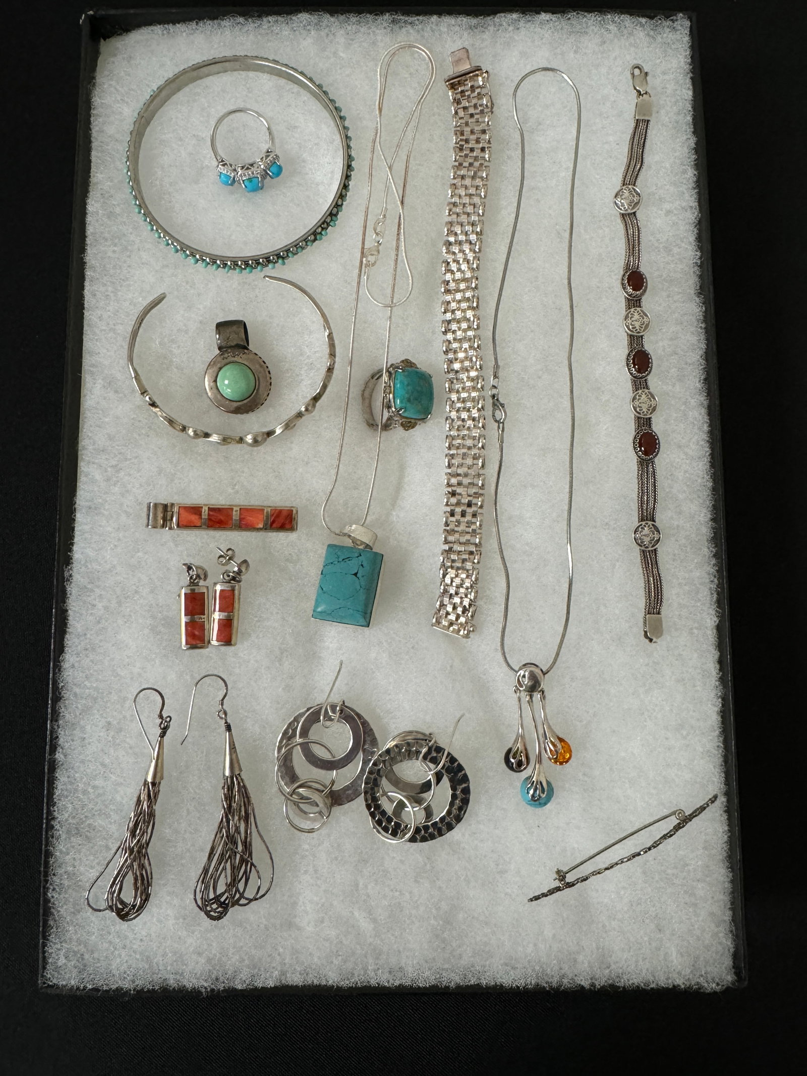 Sterling Silver & Southwestern Jewelry: includes: bracelets, pendants, necklaces and earrings.