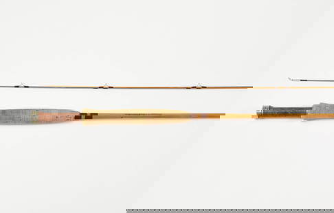 7 1/2' Orvis Madison "Adirondack" Fly Rod: Bearing serial #90757, this 2/1 5-wt. bamboo rod is in very good condition with mild soiling of the grip and the tip has a fishing set. It comes with a plain brown bag and black tube with green & gold