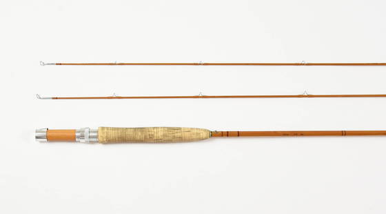 7 1/2' R.L. Winston Fly Rod: 2-piece, 2-tip rod by well known master rod maker Glen Brackett. Inked across two flats: "R.L. Winston 7 1/2' 3 oz. #1717", with translucent tan wraps, Wells grip, aluminum screw down-locking hardware