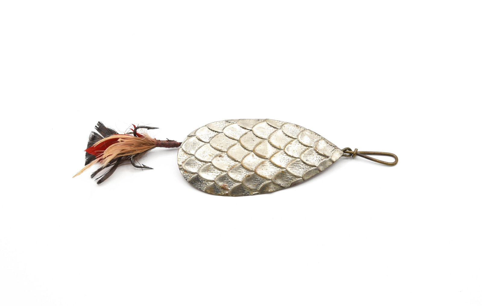 Early Pflueger/Enterprise Paragon Spoon: The large "fish scale" blade measures 3 1/4" in length and retains the majority of the red back paint. With wear and a partial bend, this rarely seen early model is in better condition than most known
