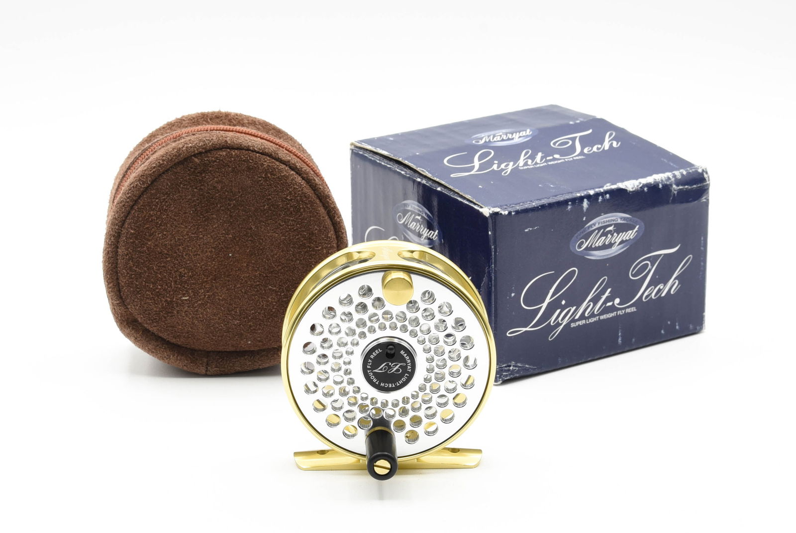 Marryat Light-Tech LT-2TR Trout Reel: 2 3/4" diam, 11/16" wide spool, left hand, works well, no wear from use, Ex condition throughout. Comes in a suede zippered pouch in the correct marked box with registration paper.