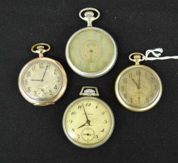 4 Pocket Watches: 2 Elgin, Waltham, New Haven in as found condition. Provenance: from an estate in Middlebury, VT along with a collection of clock, watchmakers and jewelers tools; numerous pocket watches & parts; early