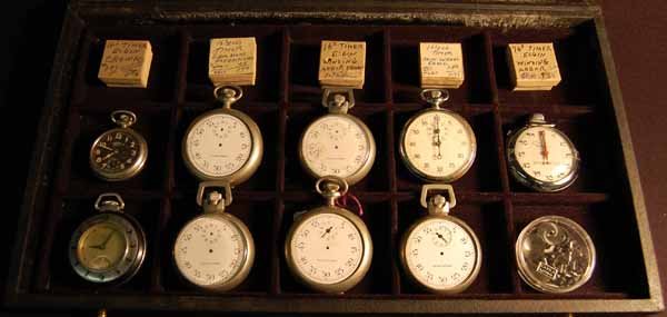 Group of Pocket and Stop Watches: including 5 Elgin Timers. Provenance: from an estate in Middlebury, VT along with a collection of clock, watchmakers and jewelers tools; numerous pocket watches & parts; early pocketwatch books & cata