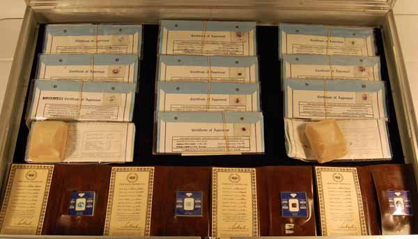 16 Gemstones with Certificate of Appraisal: stones including blue topaz, amethyst, saphire, ruby, garnet, emerald. Provenance: from an estate in Middlebury, VT along with a collection of clock, watchmakers and jewelers tools; numerous pocket wa