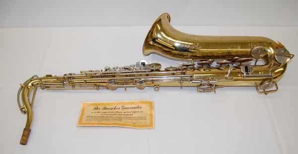 Buescher Aristocrat Tenor Sax in Bb: with case. Needs repad. Serial #574079. Provenance: from the Thomas Duda Estate, Canton, NY.