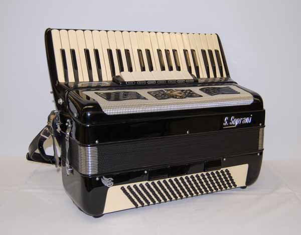 S. Soprani Accordion Musical Instrument: with case. Provenance: from the Thomas Duda Estate, Canton, NY. Serial #6117