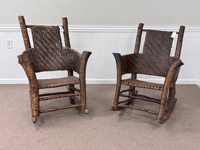 Lee Fountain Adirondack Rocking Chairs: made with yellow birch frames and woven ash splint backs and seats. Seats have been re-woven years ago. Backs have some damage to weaving. From a camp on Peck Lake in the Southern Adirondacks where th