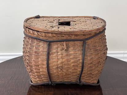 Center Hole Fishing Creel: with leather shoulder straps and made of splint black ash. 16" wide x 11.5" tall x 11" deep.