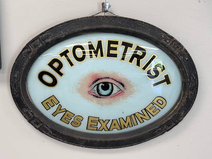 Optometrist Reverse Painted Oval Sign: Painted on glass, framed, 23" x 17"