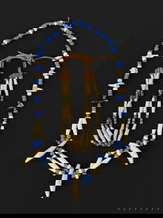 2 Native American Necklaces: one with bear claws.