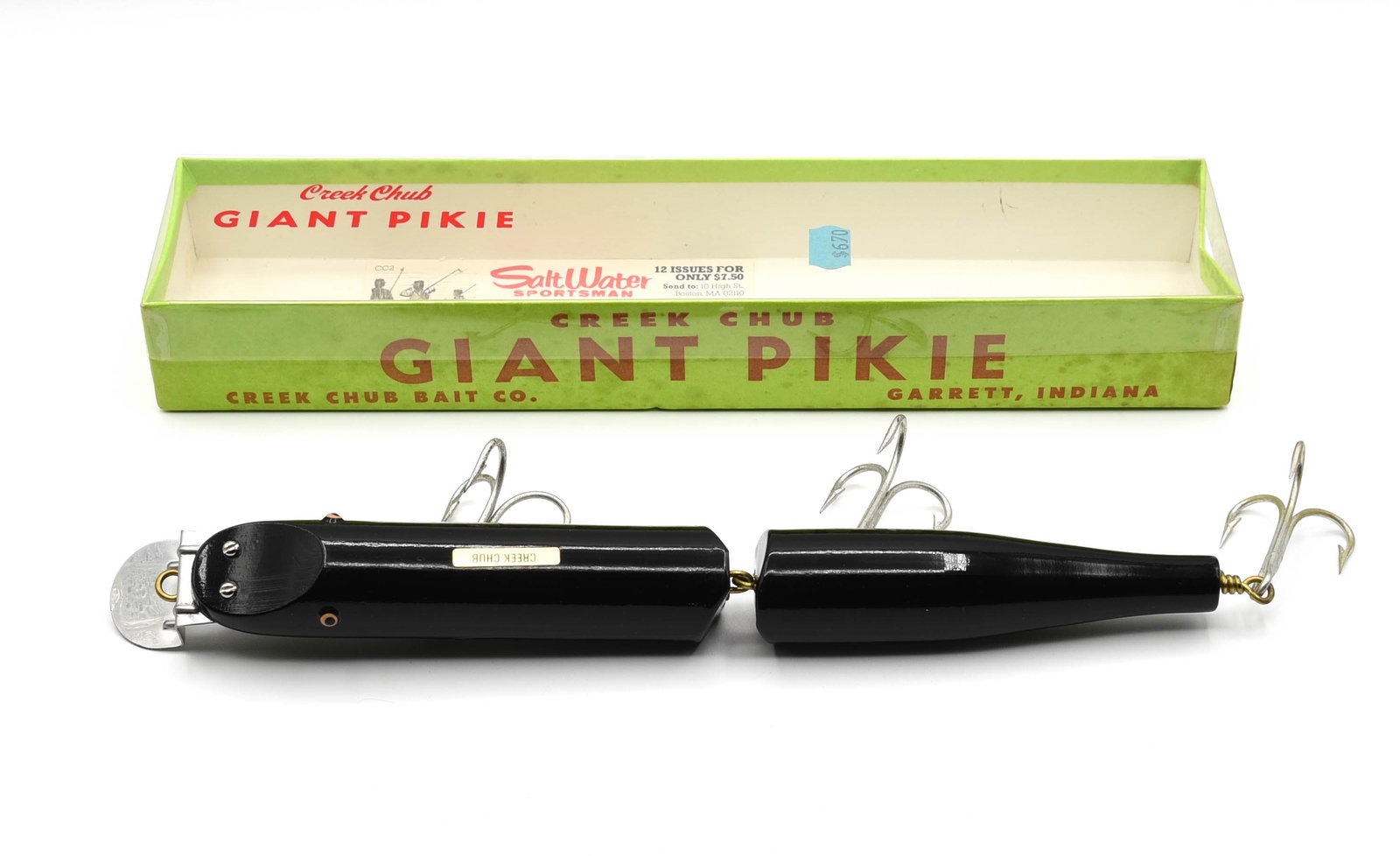 Creek Chub Giant Jointed Pikie: Exceptional condition on this solid black 800, unfished, appearing to have never been out of the box, shiny Ex condition with only a partial ring around one weight and a couple of small factory imperf