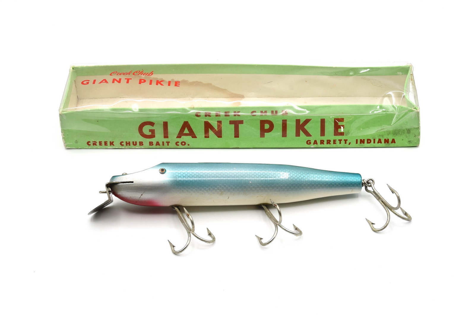 Creek Chub 6007 Giant Pikie Special: In seldom seen mullet scale, an uncataloged color on the Giant Pikie. The finish is a beautiful light blue hue with silver cheeks and red chin blush, similar to the Special Order example in The "Speci